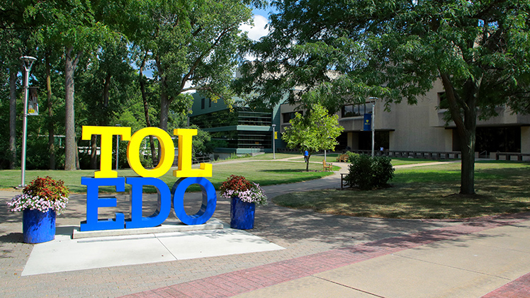 Virtual meeting background stock photo from Health Science Campus. The TOL-EDO sign on the Health Science Campus