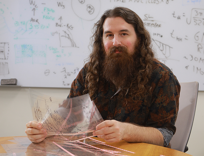 Portrait of Dr. Sam Beiler, who recently graduated from UToledo with a doctorate in physics with a concentration in astrophysics and is now a postdoctoral scholar at Trinity College Dublin.