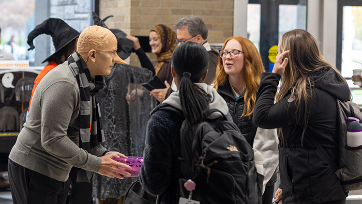 And later during the party, the president talked with UToledo students and passed out candy.