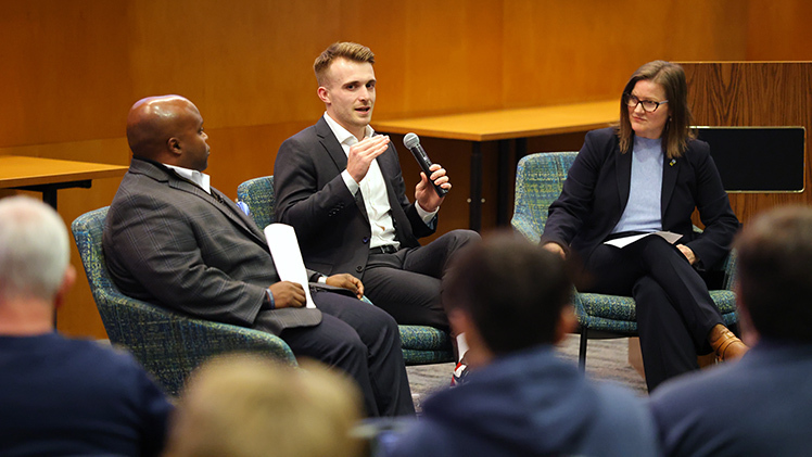 Right, Dr. Barbara Ritter, dean of the John B. and Lillian E. Neff College of Business and Innovation, and, left, Bryan Blair, vice president and director of athletics at UToledo, engaged the Cleveland Cavalier’s Ben Levicki in a discussion on how artificial intelligence is transforming the business and performance sides of professional sports.
