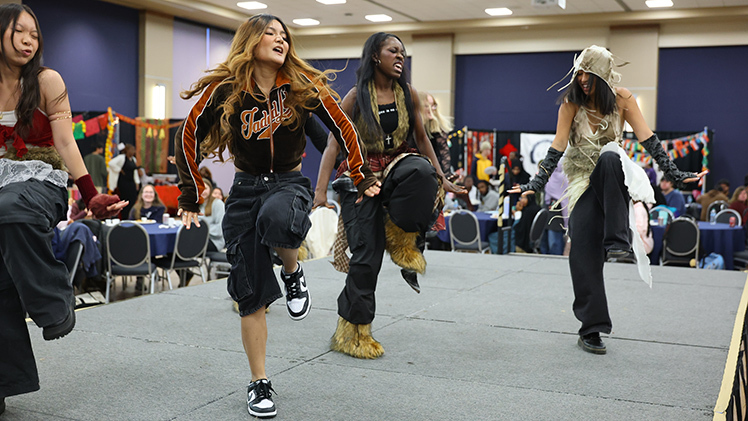 The kPop Dance Team UToledo Daebak performs during the International Students Association’s I-Village on Wednesday at Thompson Student Union Auditorium.