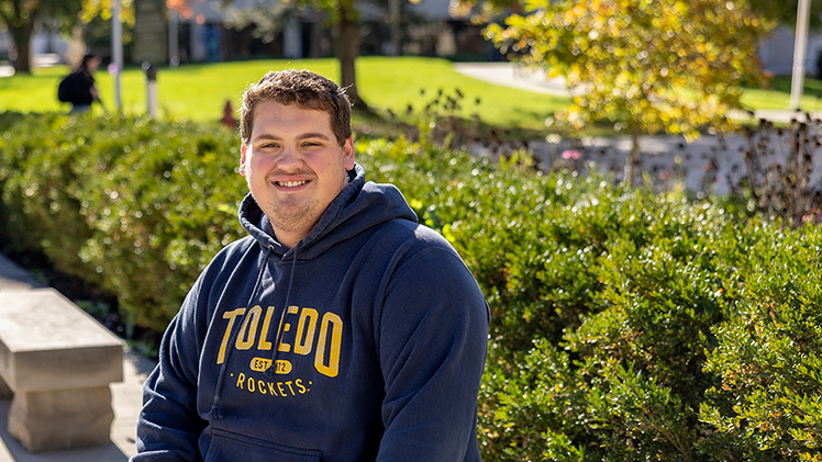Outside portrait of Matt Johnson, who is graduating in spring with a bachelor’s degree in mathematics with a concentration in actuarial science.