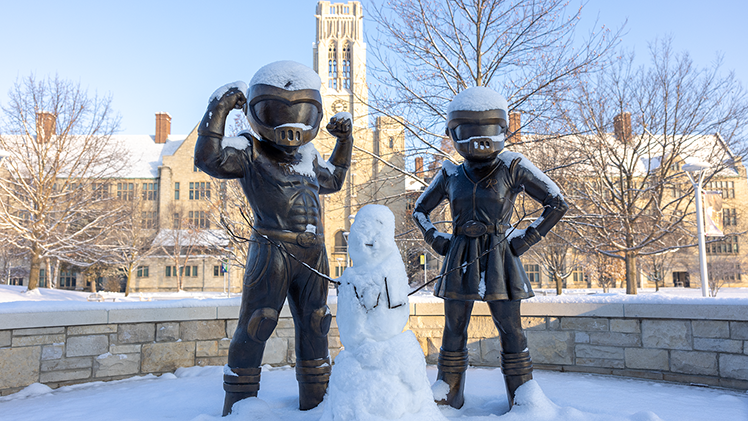 A snowman was created in between the Rocky and Rocksy bronze statues on Mascot Plaza.