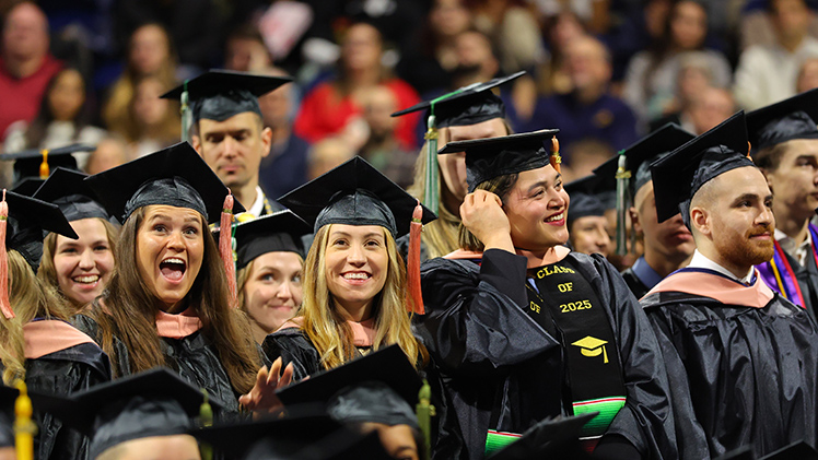 Graduating students in UToledo’s School of Nursing in the College of Natural Sciences and Mathematics smile with joy during The University of Toledo’s morning fall commencement ceremony on Saturday, Dec. 13, in Savage Arena. UToledo celebrated Class of 2025 graduates with two in-person commencement ceremonies Saturday.