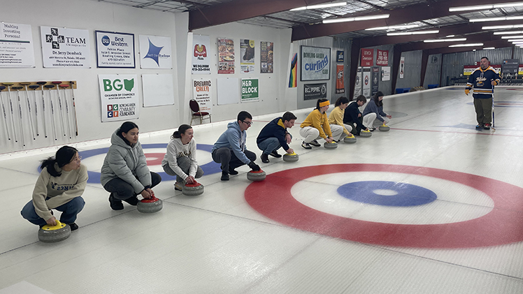 As the Winter Olympics wrapped up in Italy, members of the UToledo Honors Learning Community attempted the sport curling — many for the first time.