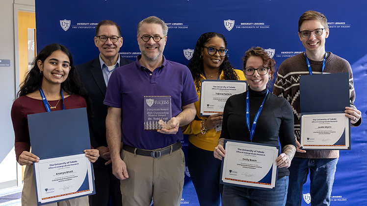 From left, Ananya Bhatt, a junior in public health; Dr. Mitchell McKinney, provost and executive vice president of academic affairs at UToledo; Dr. Todd Crail, a Distinguished University Professor in the Department of Environmental Sciences; Tajiana Poellnitz, a junior in Asian studies; Ananya Bhatt, a junior in public health; and Justin Myers, a senior in environmental sciences.