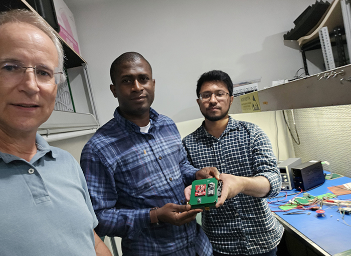 Dr. Kevin Czajkowski, from left, Dr. Olawale “Femi” Oluwafemi and Md Faisal Karim collaborated with students from three regional high schools and UToledo to design and program a satellite that’s headed into outer space on the morning of Sunday, March 29.