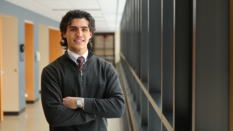 Portrait of Mohammad Almasri, a senior in professional sales and finance.