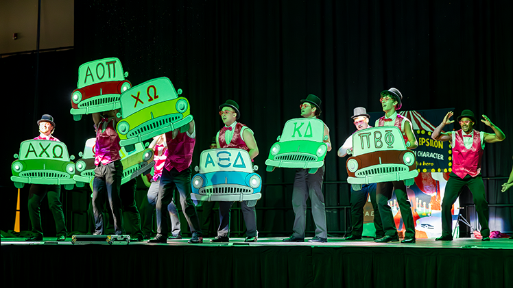 Members of the Sigma Alpha Epsilon fraternity perform onstage at the 89th annual Songfest.