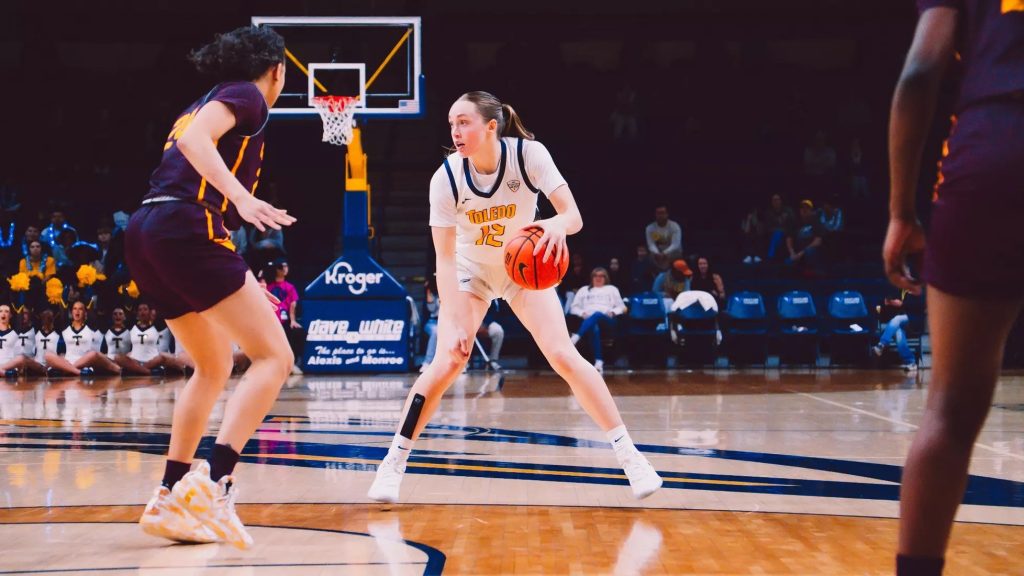 In-game photo of Toledo women's basketball player Ella Weaver, a junior who is averaging 16.0 points and 2.8 three-pointers made over her last four games entering the MAC Tournament.