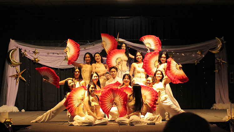 The Vietnamese Student Association takes the stage during the sold-out 48th annual International Dinner in Thompson Student Union Auditorium. Hosted by the International Students Association, I-Dinner remains a UToledo tradition that celebrates global cultures through performances, a fashion show and cuisine.