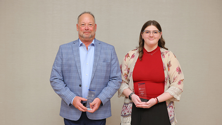 Student Employment Supervisor of the Year, left, Jeff Gajdostik, manager of grounds maintenance; and Student Employee of the Year, Emma Swanbeck, in the Office of the Division of Student Affairs.