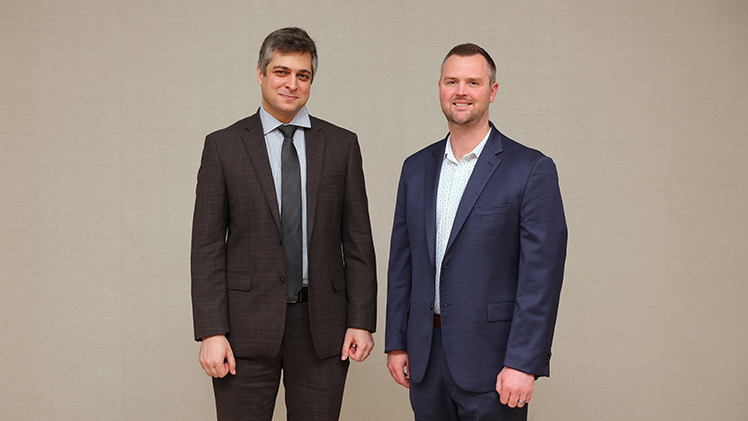 Recipients of the Edith Rathbun Award for Outreach and Engagement, from left, Dr. George Choueiri, an assistant professor in the Department of Mechanical, Industrial and Manufacturing Engineering in the College of Engineering, and Dr. Brandon Wood, an associate professor in the Department of Human Services in the College of Health and Human Services.