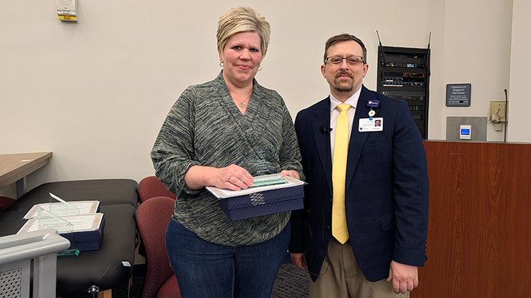 Amy Melvin, a staff nurse in the sixth-floor medical-surgical unit, and Kurt Kless, UTMC’s chief nursing officer.