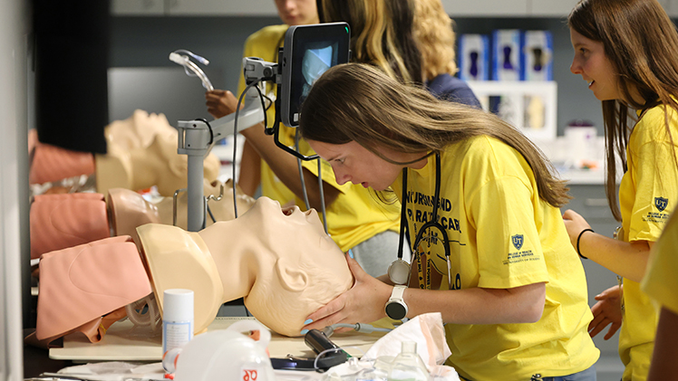 Nursing & Respiratory Care campers practice intubation techniques at the Lloyd A. Jacobs Interprofessional Immersive Simulation Center.