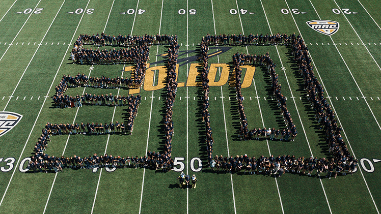 Drone shot of the Class of 2030 making the number "30" on the field of Glass Bowl Stadium.