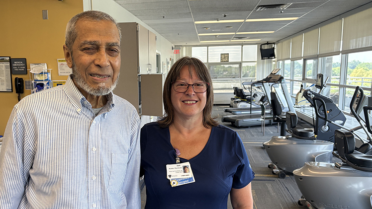 Ab Khan poses with his UToledo Health respiratory therapist Heather Mawhorter in the Cardiopulmonary Rehab clinic.