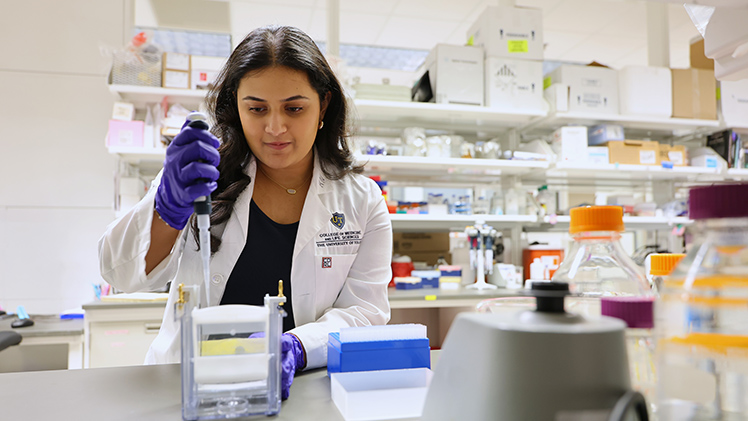 Sampriti Senapati, a neuroscience senior, researches the role of Calcium/Calmodulin-Dependent Protein Kinase II (CAMK2) in Alzheimer’s disease under Dr. Robert Smith, a professor and chair of the Department of Neurosciences and Psychiatry in UToledo’s College of Medicine and Life Sciences.