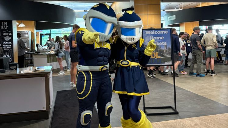 Rocky and Rocksy pose at the At The Eatery @ Student Union.