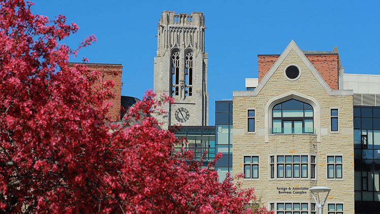 Spring foliage on main campus with buildings.