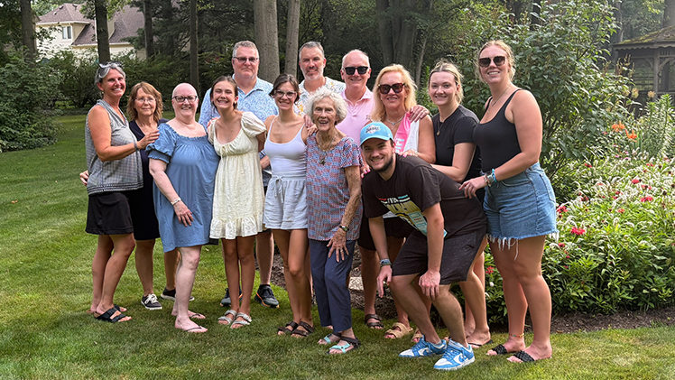 Kimberly Cole poses for a photo with members of her family.