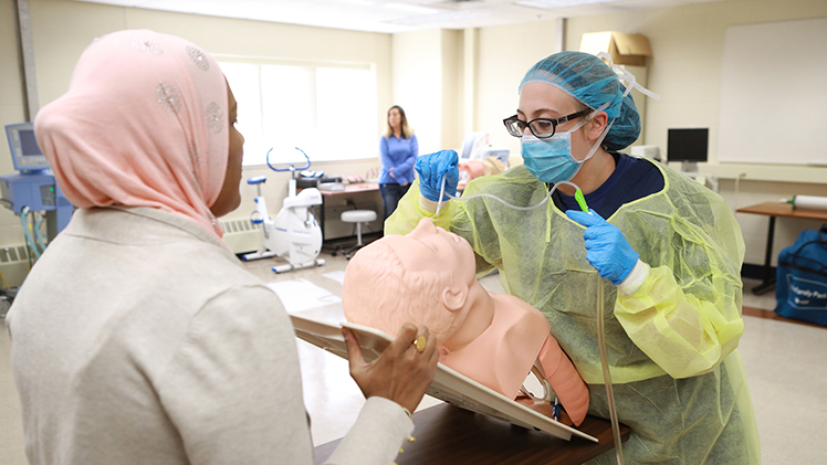 Students in the Respiratory Care Lab in the College of Health and Human Services.