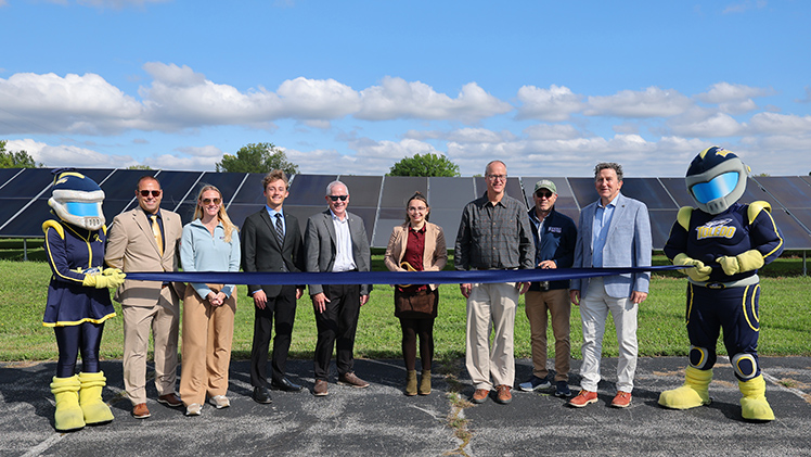 Group photo of the UToledo ribbon-cutting celebration of the expansion of its solar array near the University of Toledo Medical Center Thursday morning.