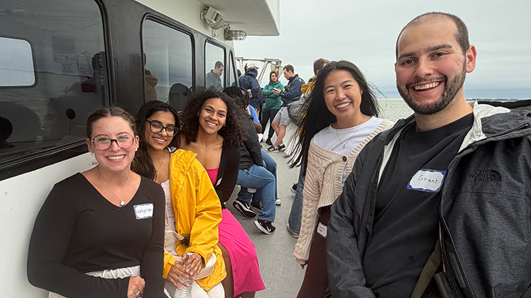 Students in the UToledo College of Medicine and Life Sciences pose on a boat in Lake Erie.