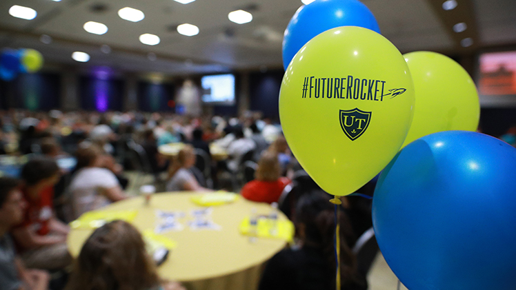 Photo of Preview Day event with a Future Rockets balloon in the foreground.